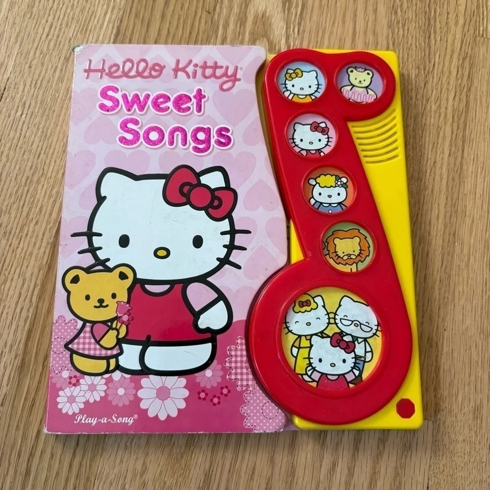 Hello Kitty Sweet Songs Musical Book Red and Yellow Hardcover